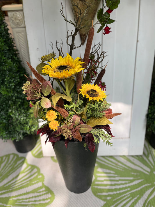 Mixed flower drop in planter